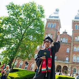 Students take photos with family and friends after the Commencement ceremony outside of Old Main May 18, 2019 on the campus of Washington & Jefferson College.